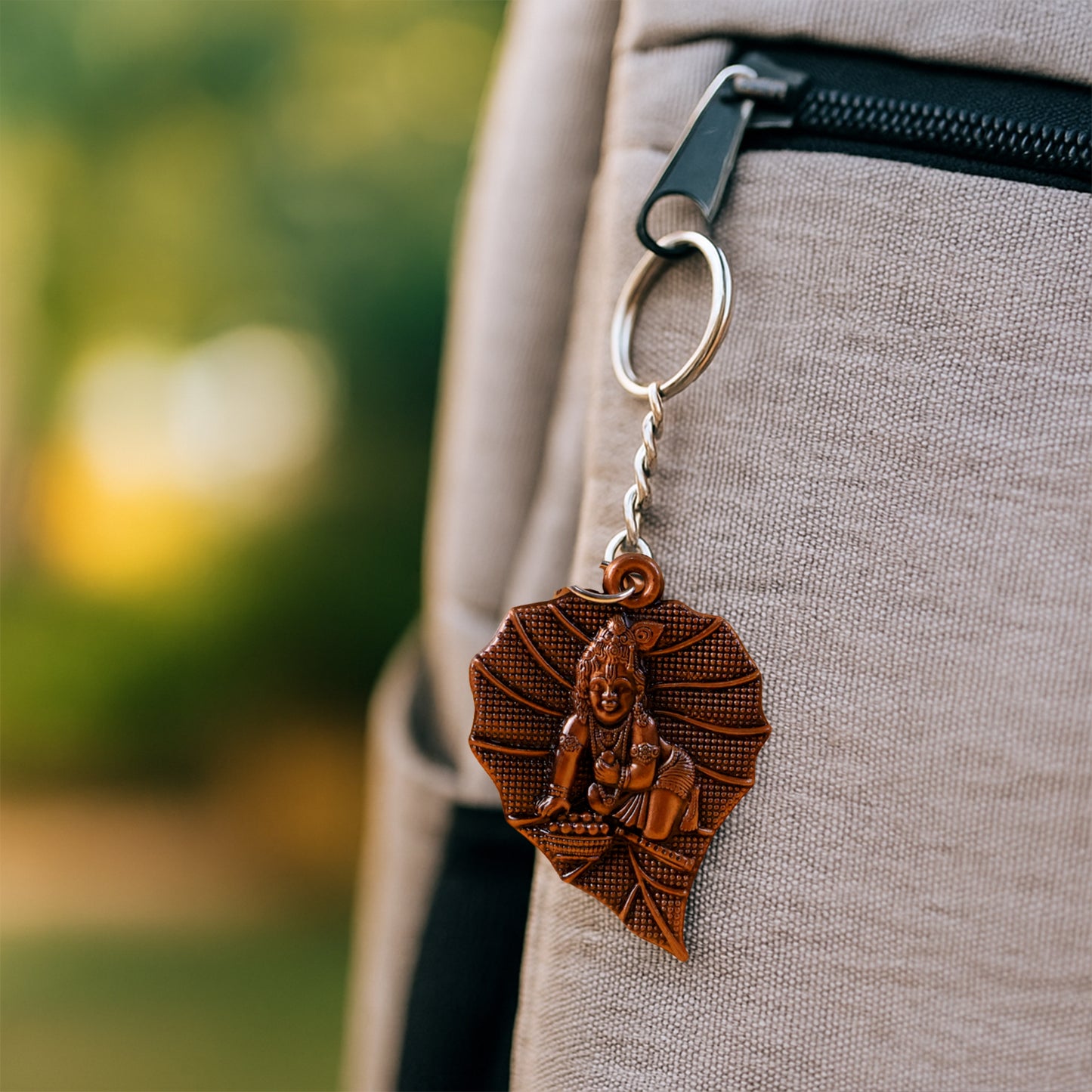Wukusy premium antique-finish metal keychain with intricate design, showcasing a vintage-style decorative accessory.