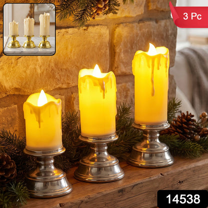 Set of three Wukusy plastic flameless LED candles with pedestal stands for decorative use, showing glowing candles on stands.