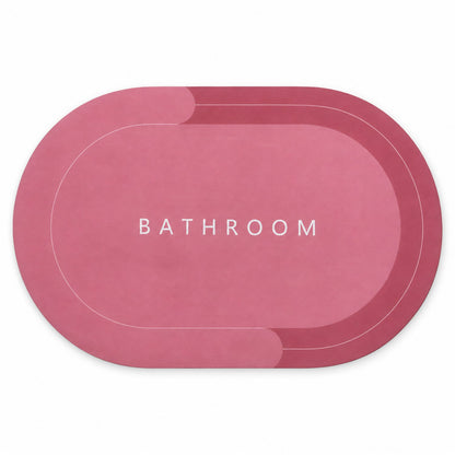 Wukusy two-tone oval bathroom rug with water-absorbing, anti-skid backing, measuring 58.5x39 cm, in soft neutral colors.