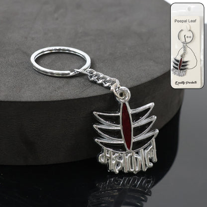 Metal Mahakal symbol keychain by Wukusy, featuring detailed design on a small, durable keychain accessory.