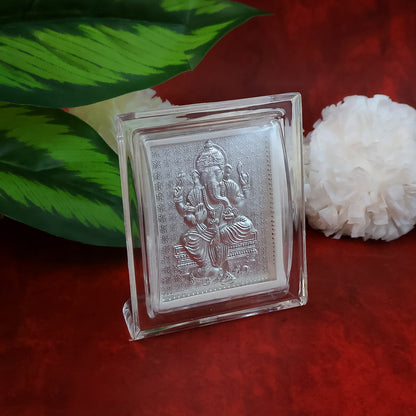 Silver-plated Lord Ganesha embossed photo frame by Wukusy, decorative home decor with intricate Ganesha design.