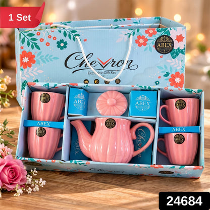 Wukusy ribbed ceramic tea set with teapot and four cups for serving and gifting, featuring a textured design.