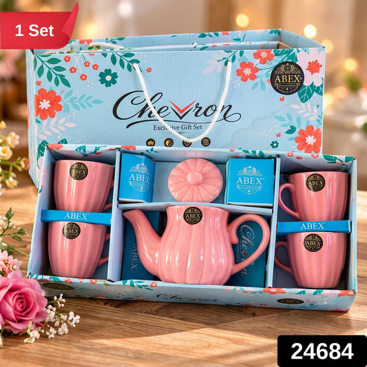 Wukusy ribbed ceramic tea set with teapot and four cups for serving and gifting, featuring a textured design.
