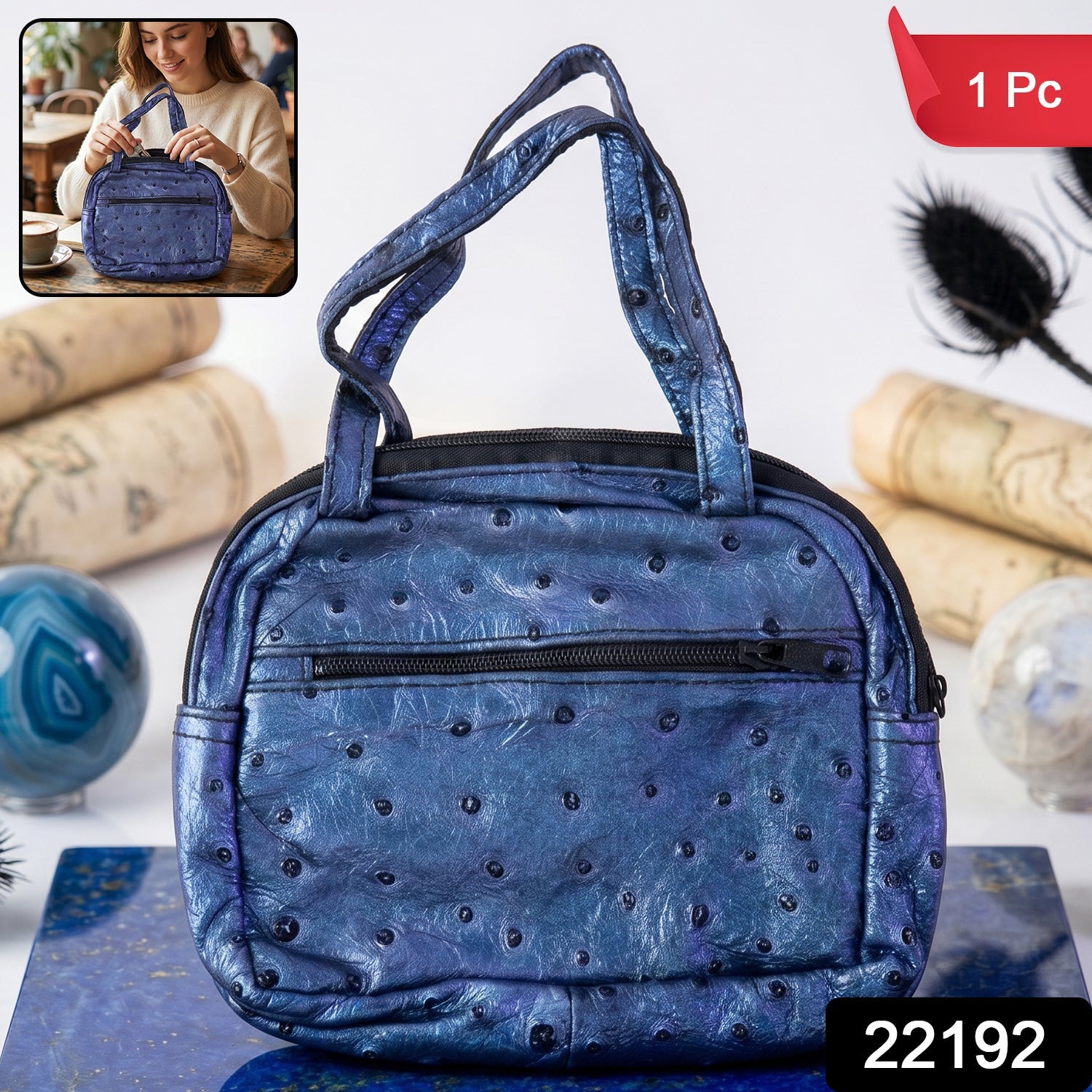 Metallic blue mini zipper handbag with ostrich pattern for women by Wukusy, showing the textured surface and compact design.