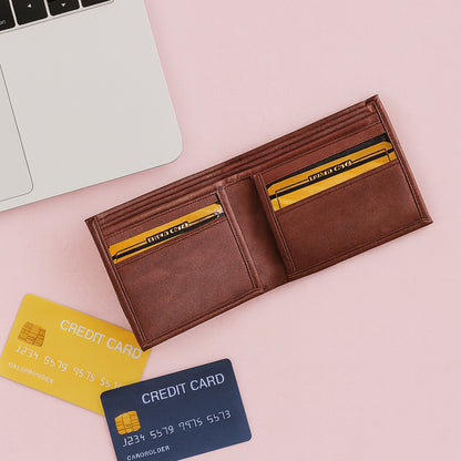 Wukusy classic men's bi-fold wallet opened to show multiple card slots and cash compartment, made of black leather.
