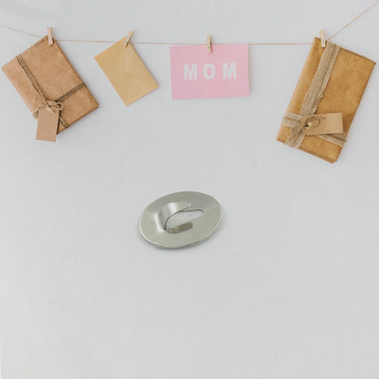 Set of 36 stainless steel wall hanging hooks by Wukusy, perfect for bathroom, kitchen, or office use for hanging clothes, keys, or calendars.