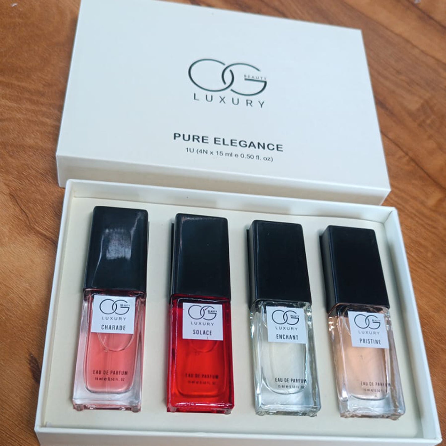 Wukusy Og Beauty Luxury Pure Elegance Eau De Parfum 4-piece set with 15ml bottles, featuring elegant perfume bottles.