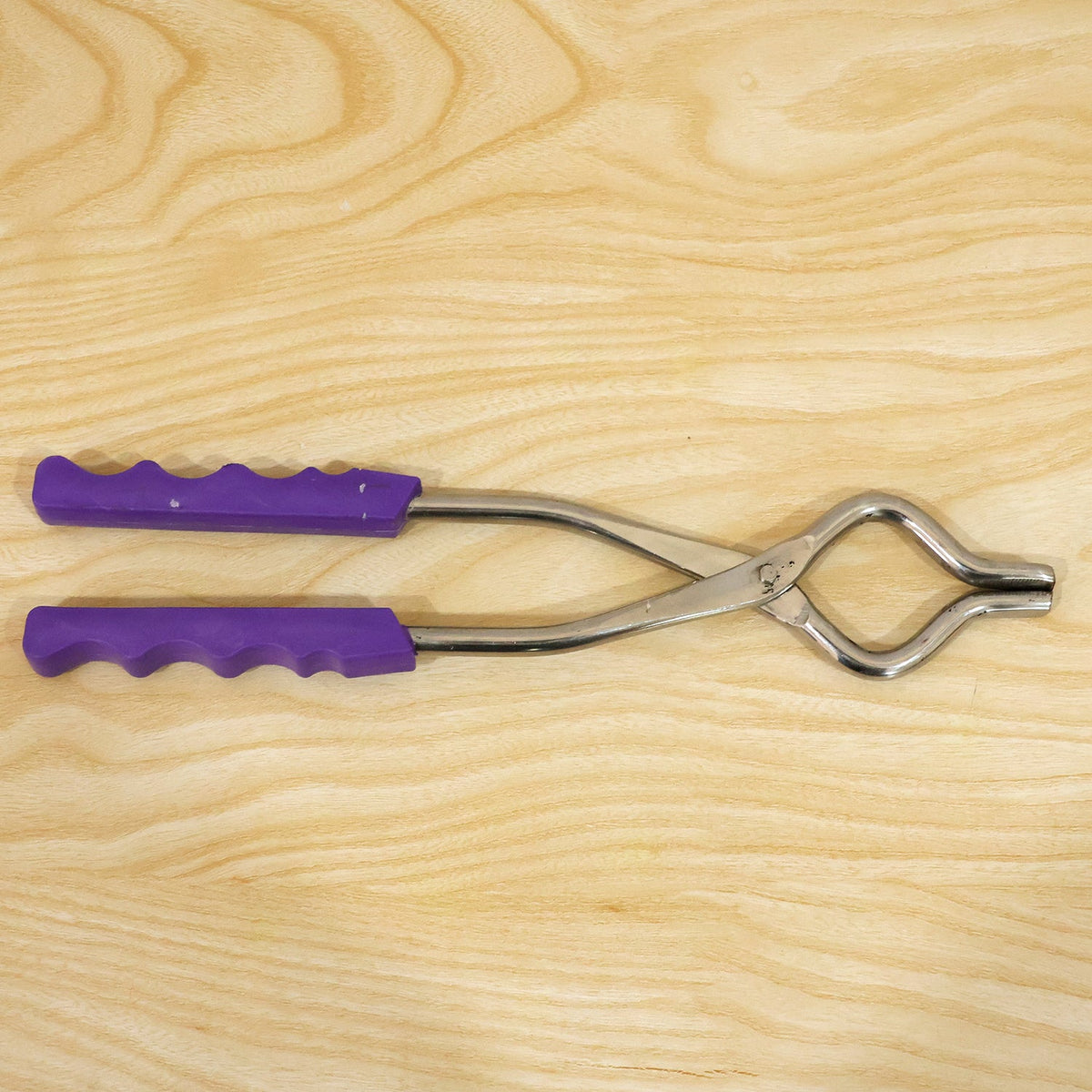 Wukusy stainless steel Sansi pakkad with plastic grip, 26 cm kitchen tool for cooking and food handling.