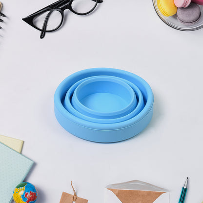 Wukusy round silicone foldable travel mug without lid, portable and collapsible for easy use at home or on the go.