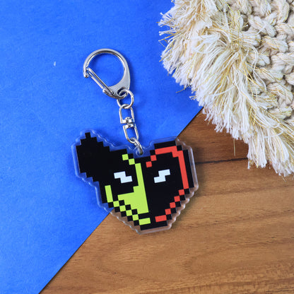 Pixel style acrylic cartoon keychain with funky design, featuring colorful artwork, ideal for home decor and accessory use.