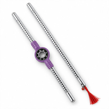 Pair of Wukusy steel dandiya sticks with textured grip, bearing center, and attached tassels for traditional dance.