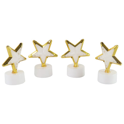 Set of four Wukusy star-shaped flameless LED candles for home decor, glowing softly with warm light.