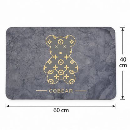 Grey absorbent bathroom mat with golden bear print, quick-drying fabric, 60x40 cm from Wukusy.