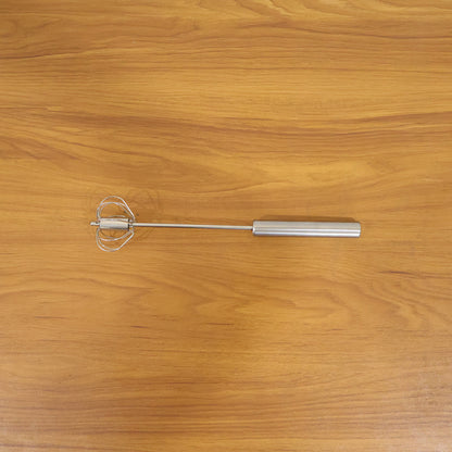 Wukusy stainless steel hand push rotary whisk, 29 cm, with a durable metal design for mixing and whipping ingredients.