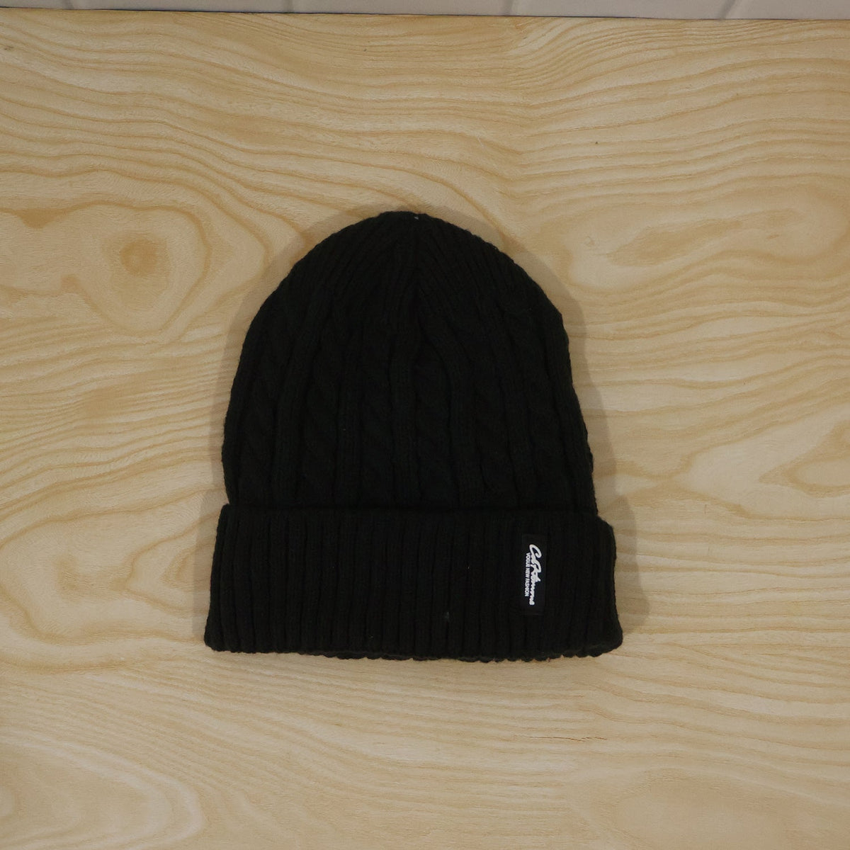 Wukusy winter cable knit beanie cap with fleece lining and folded ribbed cuff, warm and cozy for cold weather.