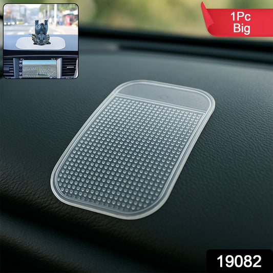 Large transparent anti-slip dashboard mat for car by Wukusy, showing textured surface on a vehicle dashboard.