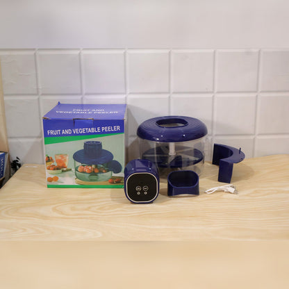 Wukusy electric food chopper with steel blades and clear bowl, showing the compact design and stainless steel blades for chopping.