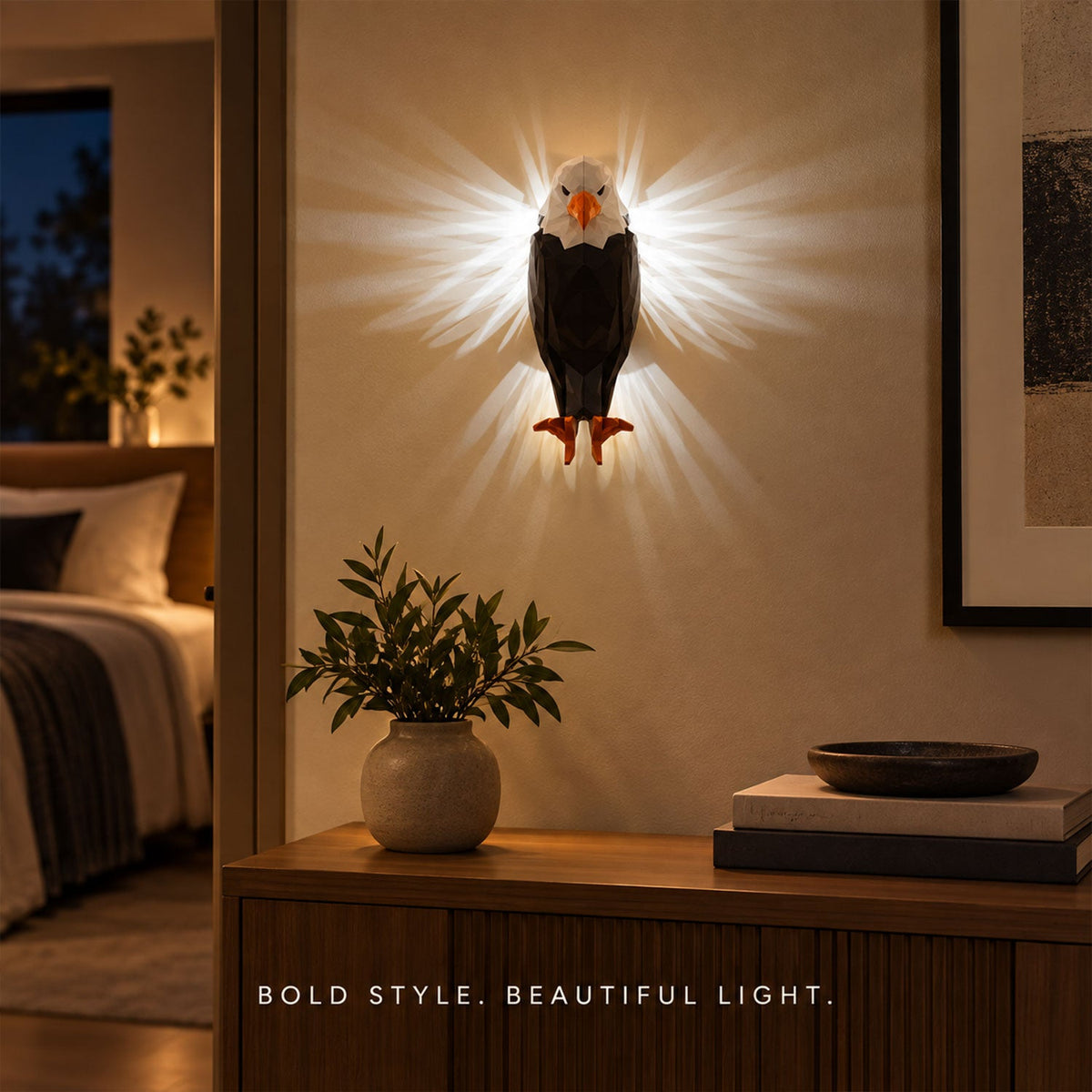 Eagle-shaped LED ambient wall light by Wukusy with remote and magnetic holder mounted on a wall in a modern setting.