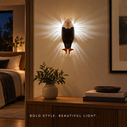 Eagle-shaped LED ambient wall light by Wukusy with remote and magnetic holder mounted on a wall in a modern setting.