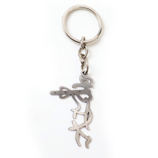 Wukusy Divine Krishna flute design metal keychain with intricate detailing and a small keyring attachment.