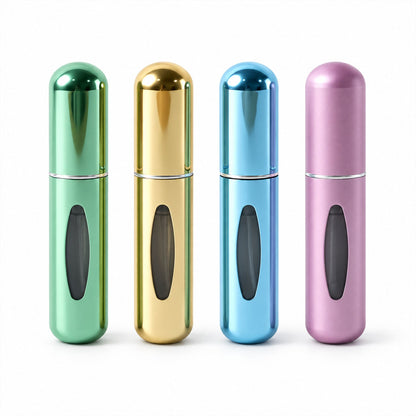 Set of four Wukusy mini refillable perfume spray bottles with refill valves, ideal for travel and portable fragrance storage.