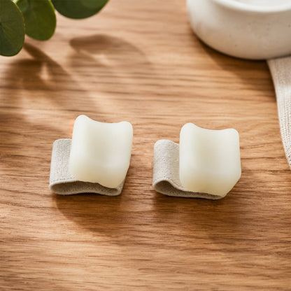 Pair of Wukusy small big toe spacer support braces with elastic loops for daily comfort and toe alignment.