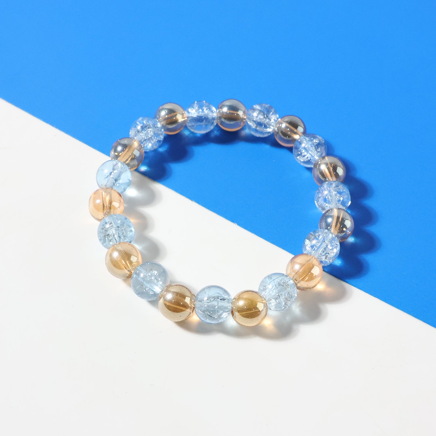 Elegant dual-tone crystal beaded stretch bracelet by Wukusy featuring sparkling beads and a sleek, flexible design.