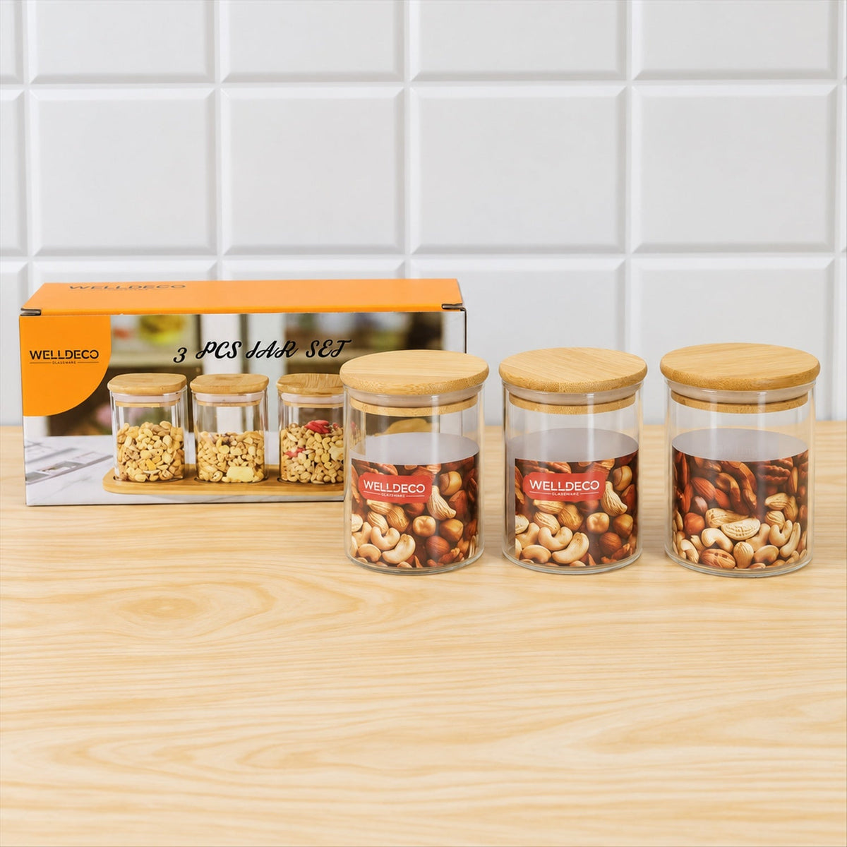 Set of three Wukusy glass storage jars with bamboo lids, ideal for kitchen organization and dry foods or fruits.