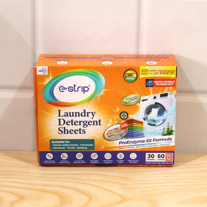 Wukusy laundry detergent sheets for clothes washing, 30 sheets for up to 60 loads, with folded sheets and clean laundry in the background.