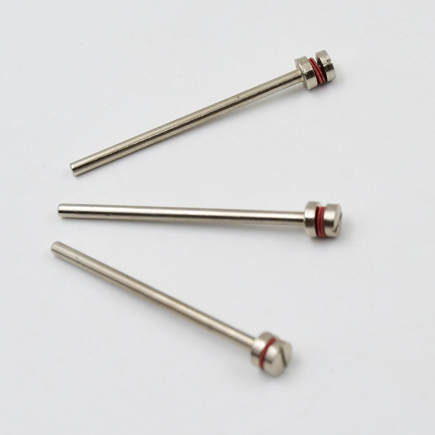 Set of three Wukusy cut-off wheel screw mandrels with shank diameters, designed for holding cutting discs in hardware applications.