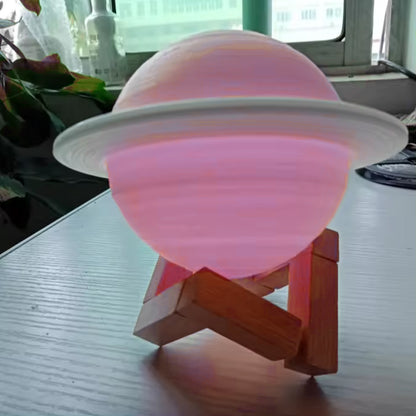 Wukusy 3D Saturn lamp home decoration with multicolor LED night light and base, ideal for bedside or living room decor.