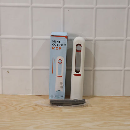Wukusy handheld mini cotton mop for cleaning desks and glass surfaces, featuring self-squeeze portable design.