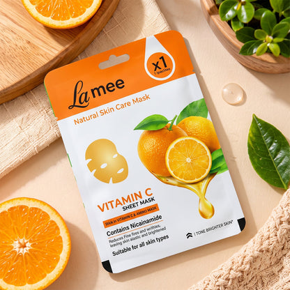 Wukusy Vitamin C facial sheet mask with niacinamide for hydrating skin care, showing the sheet mask on a clean face.