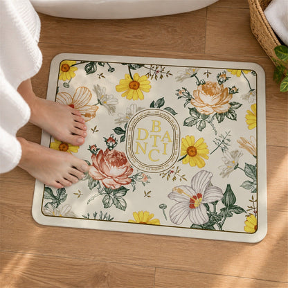 Wukusy absorbent floral print bathroom mat, quick-dry bath mat in 50x40 cm size, with colorful floral pattern on soft fabric surface.