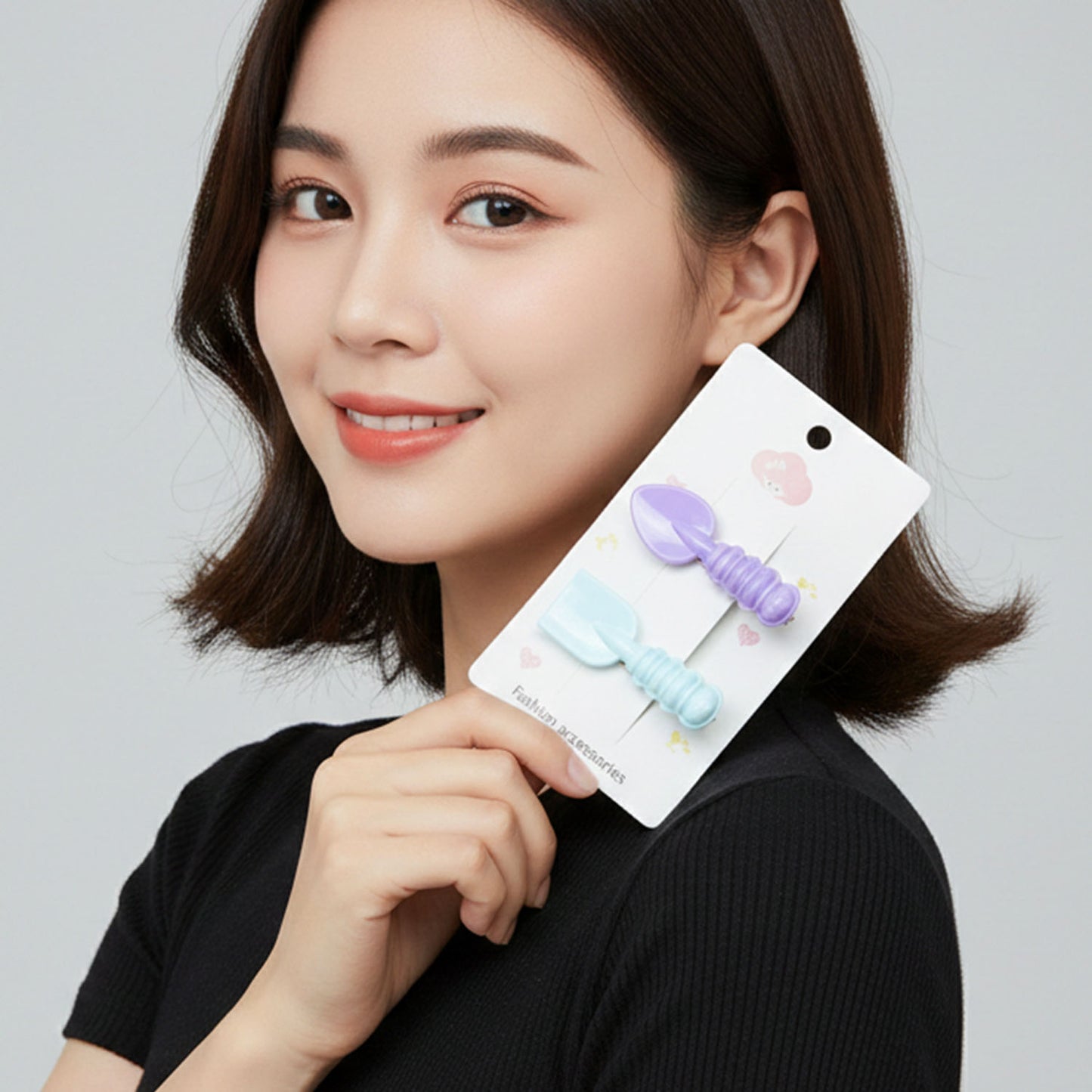 Set of two Wukusy mini spade leaf-shaped hair clips, featuring cute and natural design for women's hair accessories.