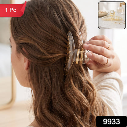 Transparent plastic hair clip by Wukusy, claw style for women, shown in close-up on a white background.