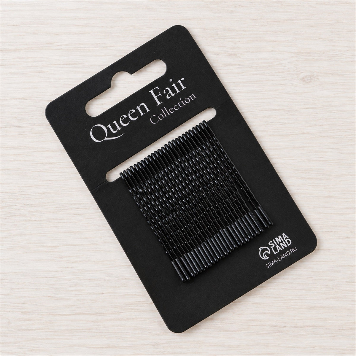 Set of 25 Wukusy metal bobby hair pins with wavy grip and rounded tips for everyday styling, shown arranged on a white background.