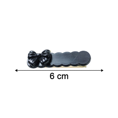 Set of three elegant black bow decorative hair clips by Wukusy, featuring stylish accessories for hair styling.