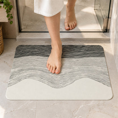 Wukusy absorbent bathroom mat with abstract wave line print, quick-dry design, 60x40 cm, placed on a bathroom floor