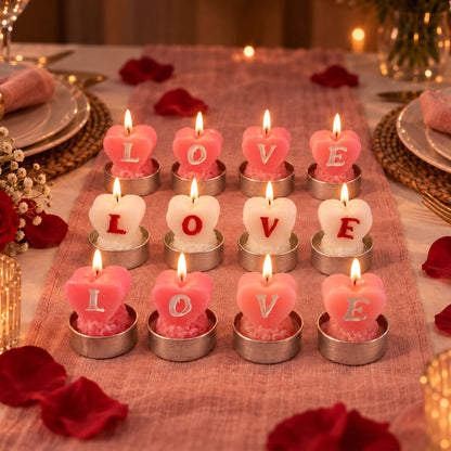 Set of 12 Wukusy heart-shaped love tealight candles for romantic table decoration, featuring pink and red wax in a decorative arrangement.
