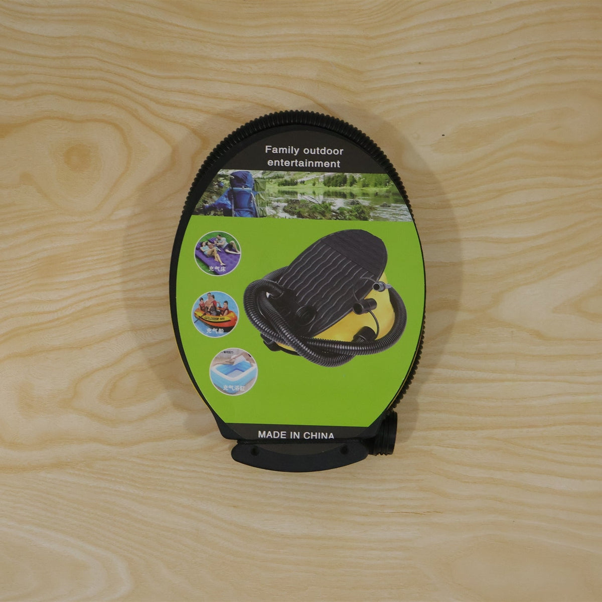 Wukusy manual foot air pump with flexible hose and nozzles for inflating pool floats and air beds, shown with attached nozzles.