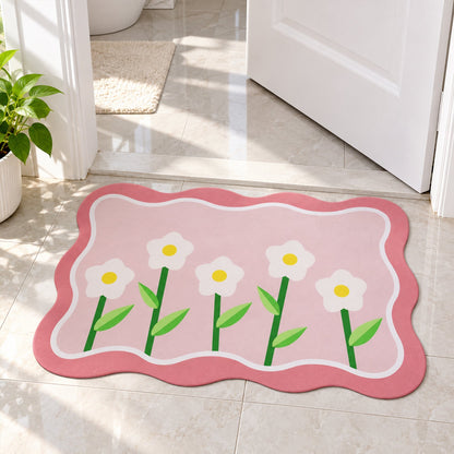 Decorative floral bathroom floor mat by Wukusy with wavy border design, 59x40 cm, featuring colorful floral patterns on soft fabric.