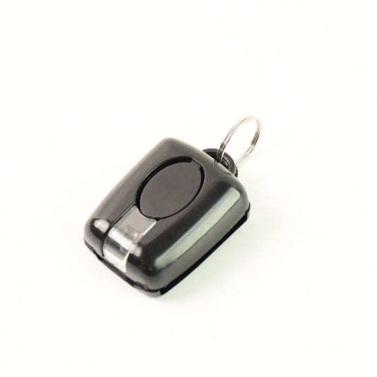 Wukusy mini LED torch keychain with attached keyring, compact portable flashlight for everyday use.