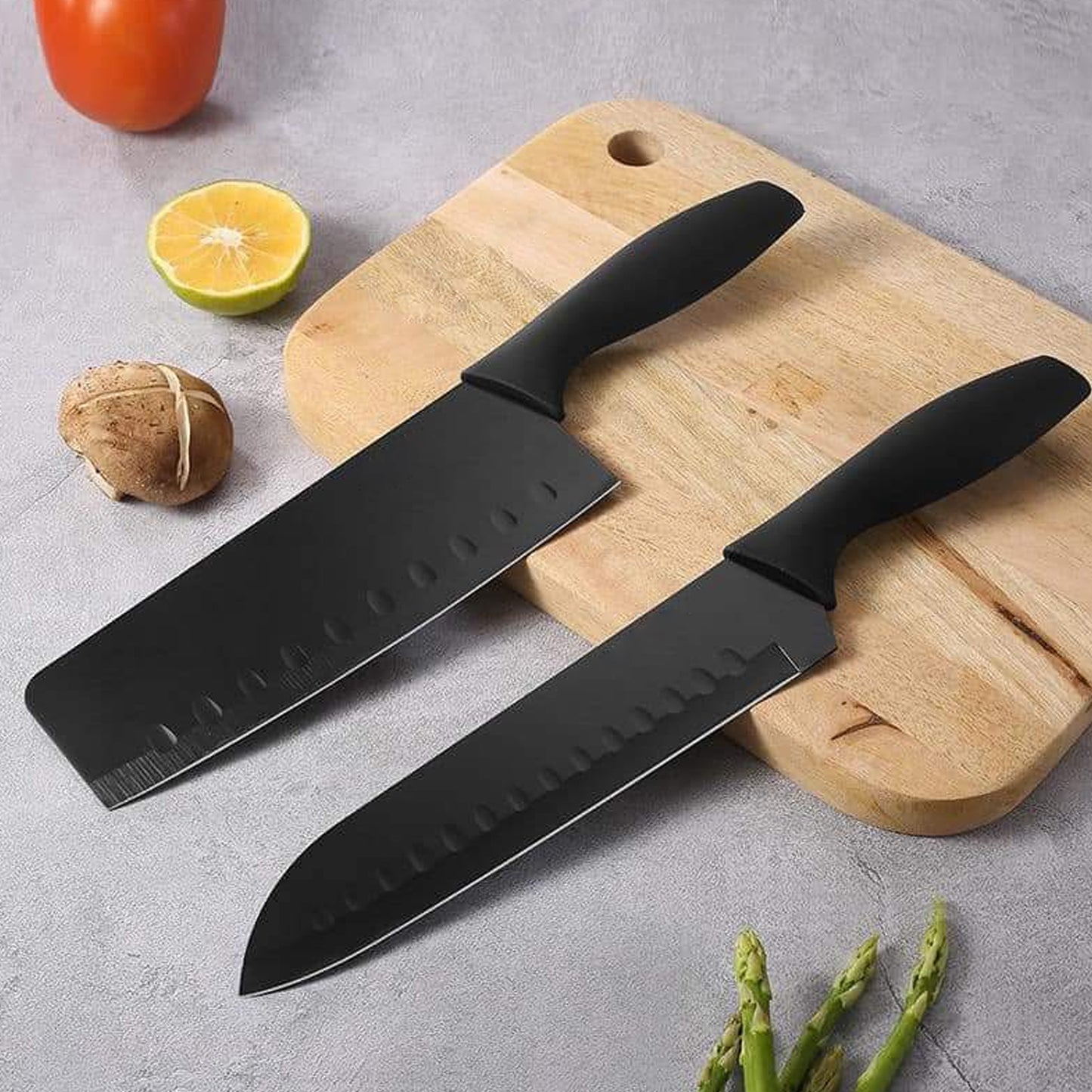 Wukusy 5-piece forged stainless steel kitchen knife set includes chef, utility, chopping, and butcher knives for cooking tasks.