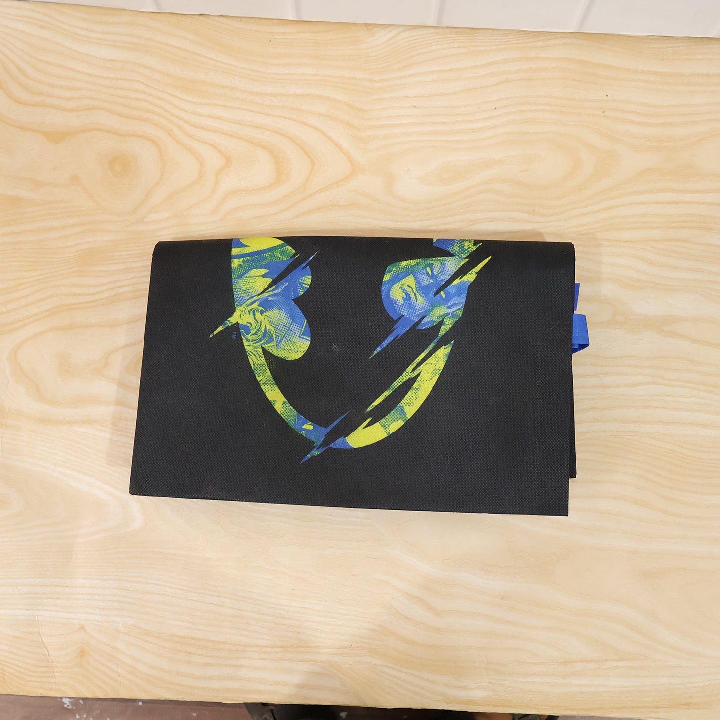 Large Wukusy multipurpose carry hand bag in black fabric, 33x43 cm, with sturdy handles and spacious interior for versatile use.