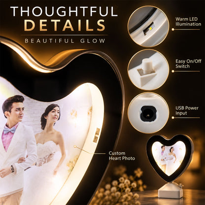 Heart-shaped LED mirror photo frame with warm light, ideal for tabletop home decor, by Wukusy.