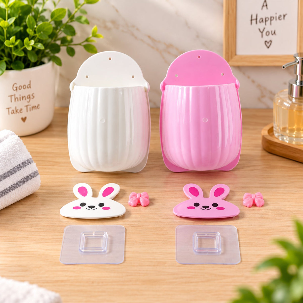 Wukusy rabbit design wall-mounted toothbrush holder set with two pieces for bathroom storage, featuring playful bunny shapes.