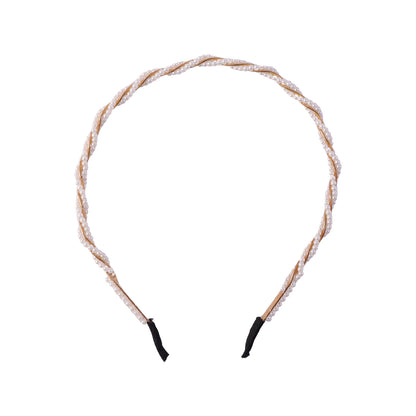 Elegant pearl design hairband by Wukusy featuring a delicate string of pearls on a sleek hair accessory.