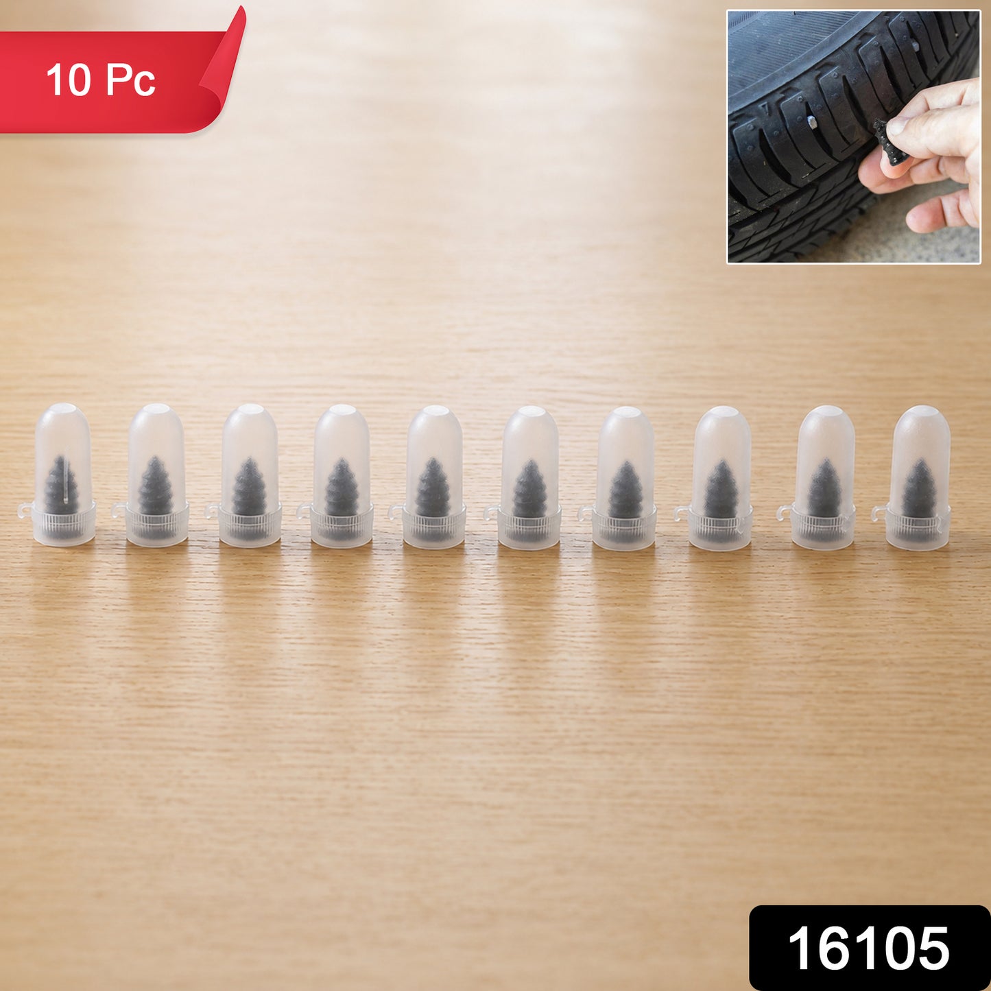 Set of 10 black Wukusy car bike tire puncture repair nails and screws on a plain background.