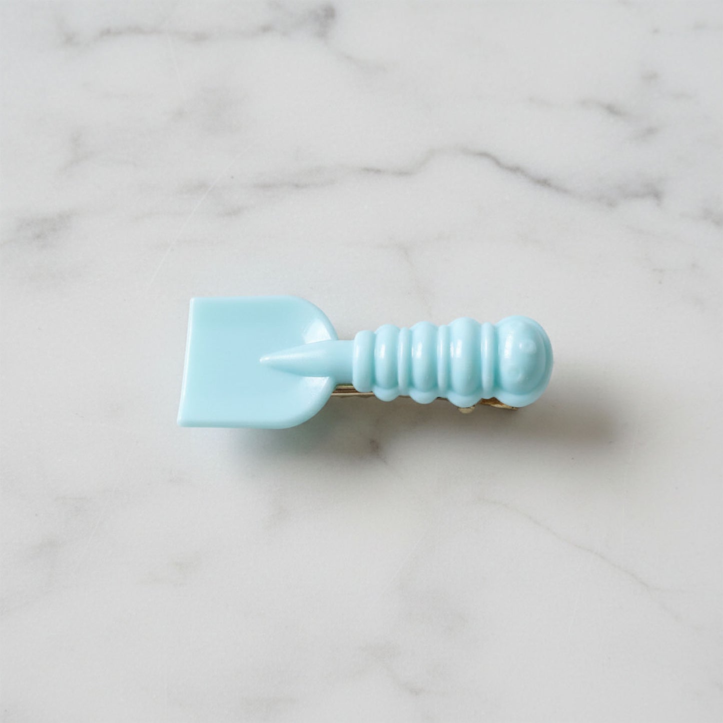 Set of two Wukusy mini spade leaf shape hair clips, cute and colorful accessory for hair styling and decoration.